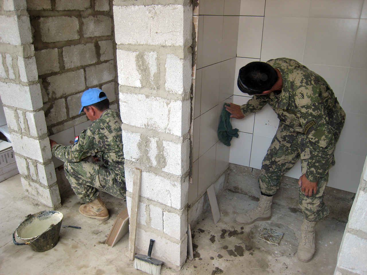 These PARENGCOY IV NCOs are seen here at work at the Bon Zami orphanage where the unit was building a sanitary block. (Photo: Erwan de Cherisey)